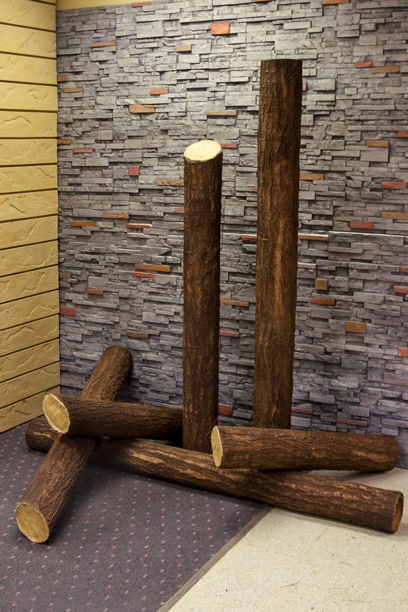 Flexbark fabricated logs