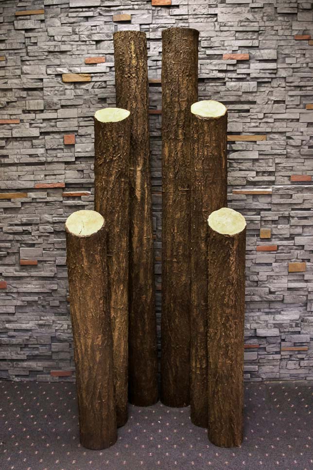 Flexbark fabricated logs